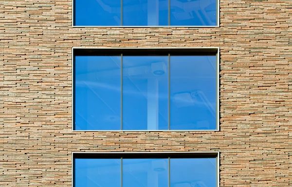 Modern brick wall with wndows — Stock Photo, Image