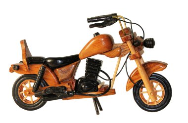 Wooden toy motorcycle on a white background clipart