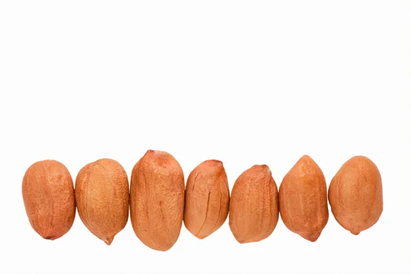 Erdnüsse verpackt in einer Reihe von. — Stockfoto