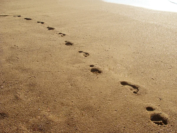 Fußabdrücke im Sand — Stockfoto