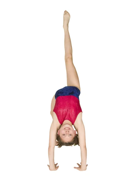 10 anno vecchio ragazza in ginnastica pose — Foto Stock