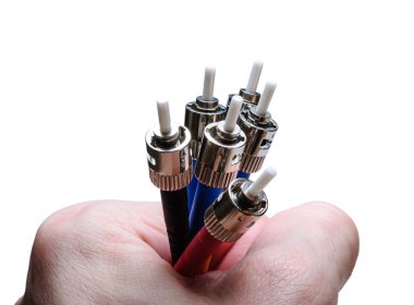 Optical connectors in the hand clipart