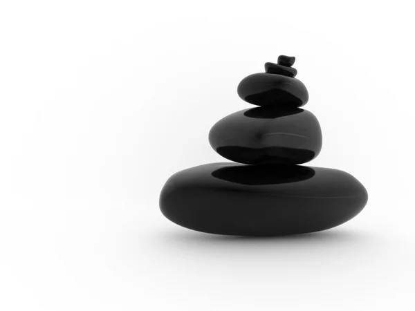 Pilha equilibrada de pedras pretas sobre um fundo branco — Fotografia de Stock