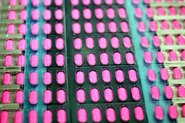 Pills On The Conveyor Belt — Stock Photo, Image