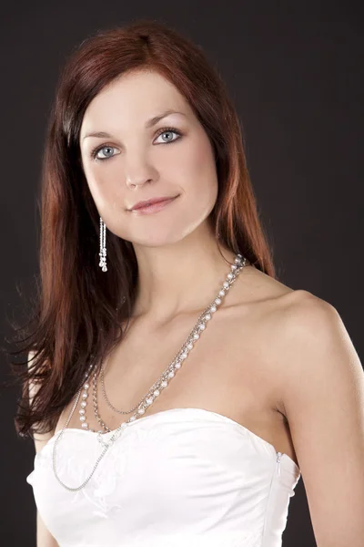 Brunette and white dress — Stock Photo, Image
