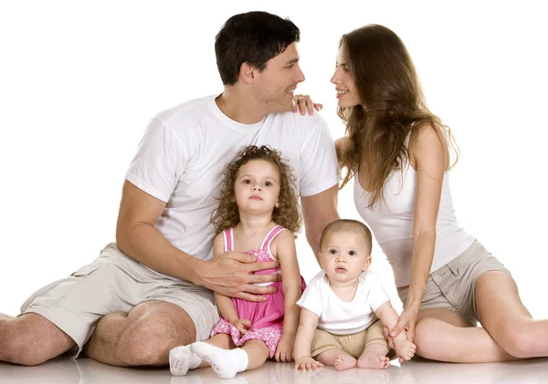 Family of four together — Stock Photo, Image