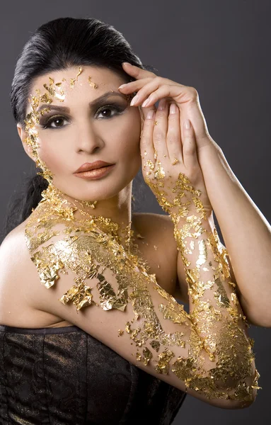 Mulher em ouro — Fotografia de Stock