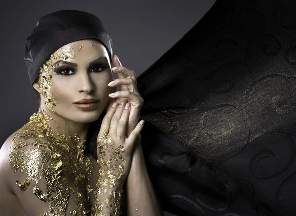 Mujer en oro — Foto de Stock