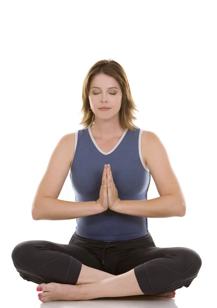 Mulher exercendo ioga — Fotografia de Stock