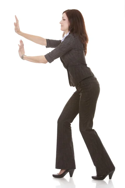 Business woman pushing — Stock Photo, Image