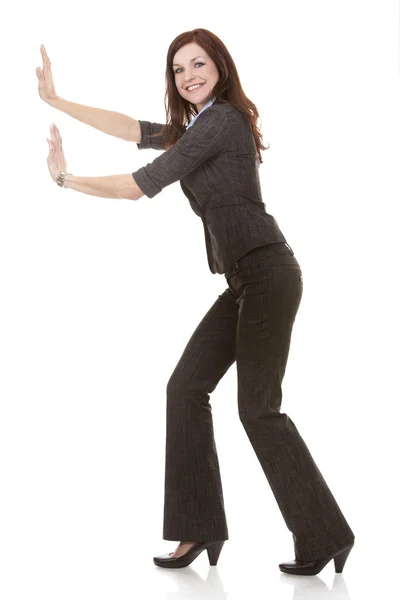 Business woman pushing — Stock Photo, Image