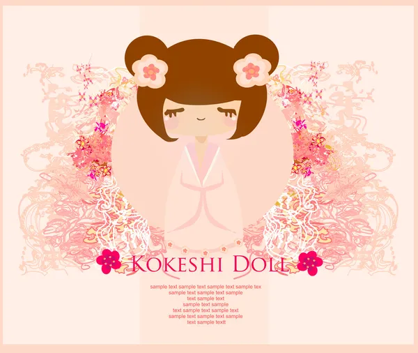 Pembe arka planda çiçekli Kokeshi bebeği. — Stok fotoğraf
