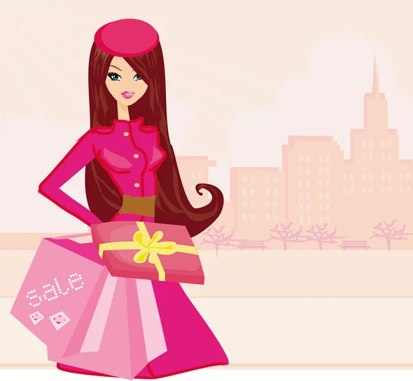 Alışveriş torbaları ve hediye kutusuyla moda alışverişi yapan kız. — Stok fotoğraf