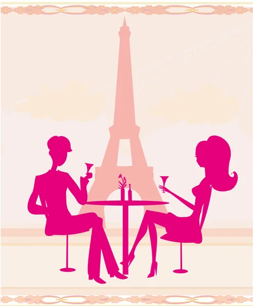 Jong stel flirt en drinkt champagne in Parijs — Stockfoto
