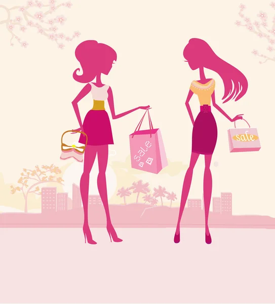 Moda siluetleri Şehirde alışveriş yapan kızlar — Stok fotoğraf
