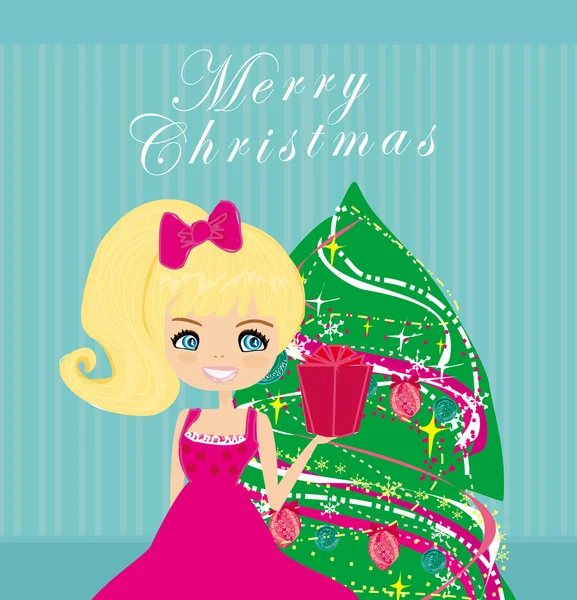 Симпатичная девушка с коробкой подарков рядом с рождественской елкой — стоковое фото