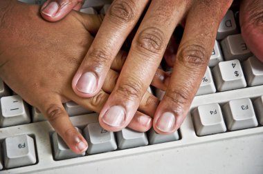 Parent Stopping Child's Hand At Computer clipart