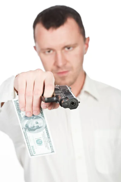 Muž s pistolí a dolar — Stock fotografie