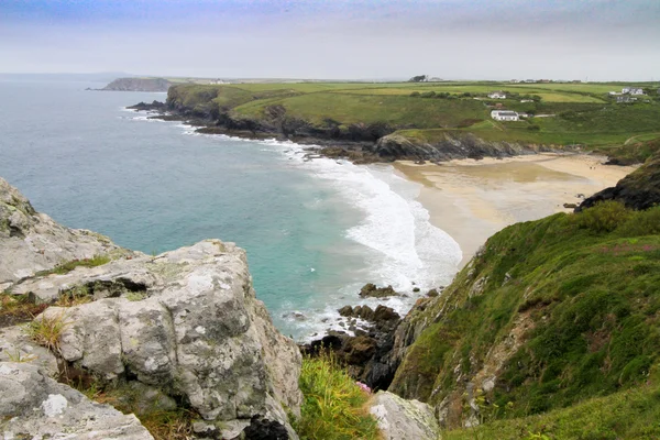 Polurrian beach in Cornwall from a cliff top path — Stock Photo, Image