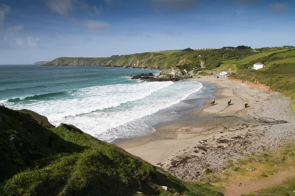 Caballos en la playa de Polurrian en Cornwall —  Fotos de Stock