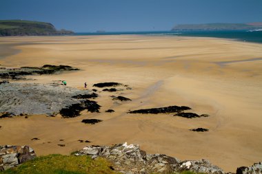 The sandy bay of the River Camel estuary between Padstow and Rock in Cornwall clipart