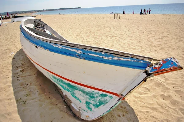 stock image Old blue boat on the beach