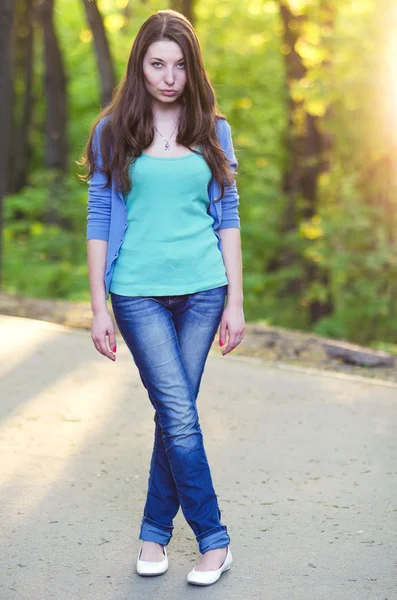 Young woman in blue shirt — Stock Photo, Image