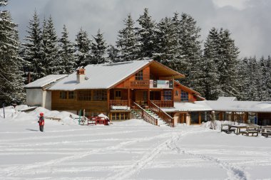 Mountain shelter with restaurant clipart