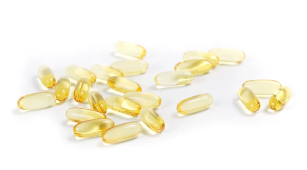 Cod-liver pills on white background — Stock Photo, Image