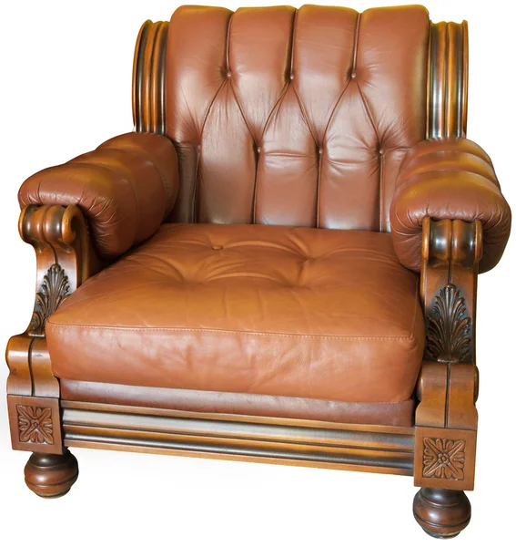 Old wood and leader armchair with woodcarvings — Stock Photo, Image