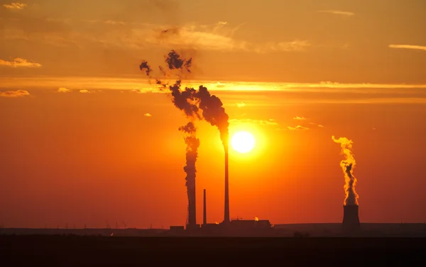 Large electric plant at sunset — Stock Photo, Image