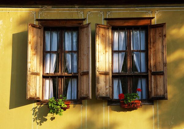 Window of a traditional Bulgarian house, home exterior