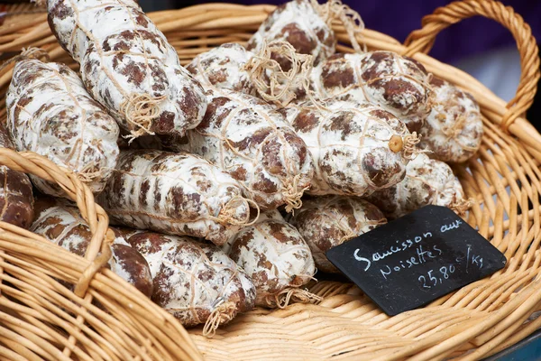 Sausage with hazelnuts at Provence market — Stock Photo, Image