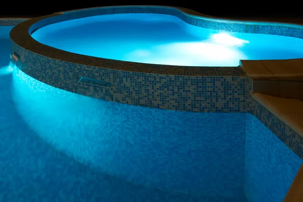 Small swimming pool at night Stock Picture