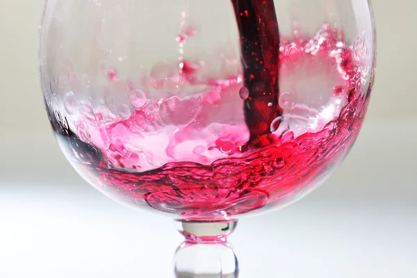 Splash ot rött vin — Stockfoto
