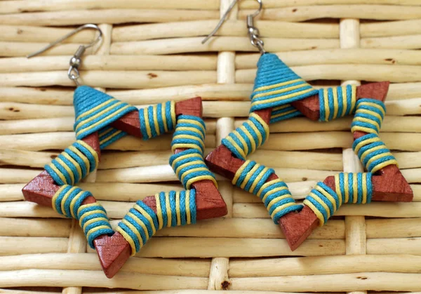 Wooden earrings in ethnic style — Stock Photo, Image