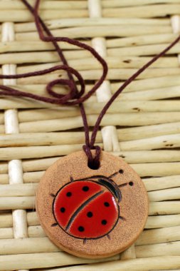 Clay amulet ladybug clipart