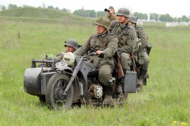 German soldiers of WW2 at motorbile clipart