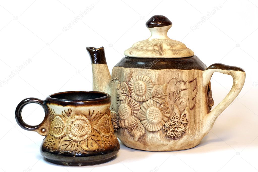 Brown ceramic cofee (tea) cup and teapot