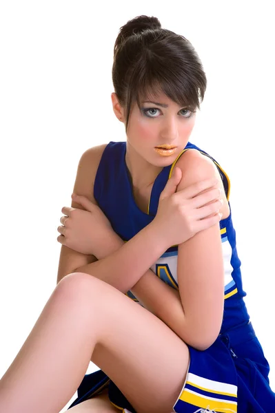 Beautifull young brunette cheerleader in blue suit — Stock Photo, Image