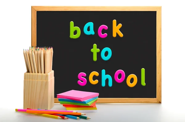 stock image Box of coloured pencils. Back to school blackboard