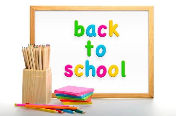 stock image Box of coloured pencils. Back to school blackboard