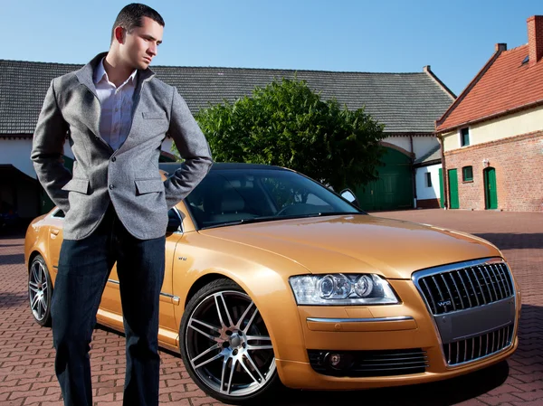 Portrait of handsome business man near the car — Stock Photo, Image