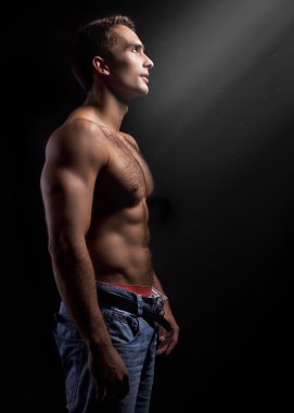 Art photo of a young muscular man clipart