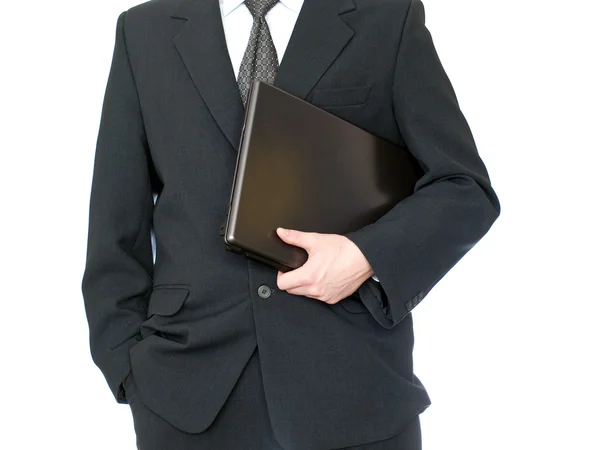 Un hombre de negocios con un portátil. Aislado sobre blanco . — Foto de Stock