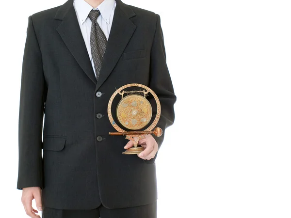 Businessman holding gong — Stock Photo, Image