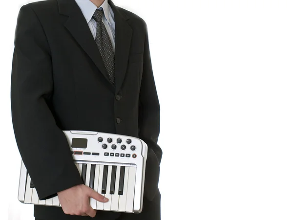 Affärsman med instrument med i kostym — Stockfoto