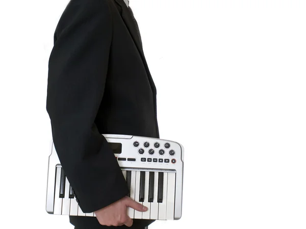 Businessman with instrument with in suit — Stock Photo, Image