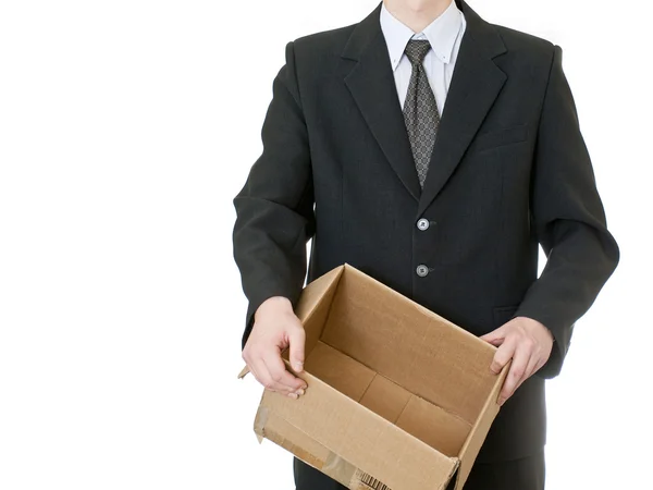 Uomo d'affari che tiene la scatola su sfondo bianco — Foto Stock