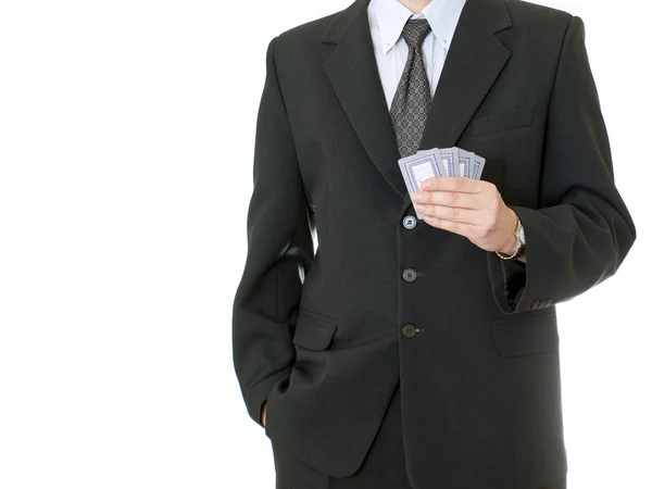 Uomo d'affari in possesso di carte da poker — Foto Stock